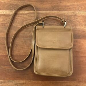 Cooper Creek crossbody bag. Great for a quick trip out.  Holds credit cards & ID